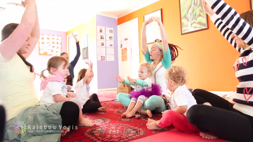 Rainbow Pammy running a toddler yoga session